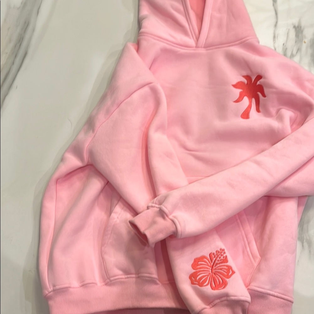Pink Hoodie with Tropical Embroidery
Brand new never worn
With original box